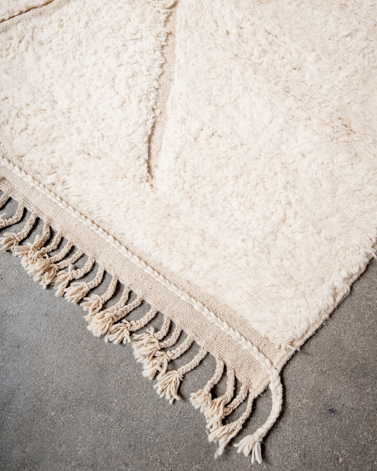 Modern, designer, handcrafted Berber rug from Morocco. Beniourain carpet with beautiful colours and patterns and fluffy wool texture.